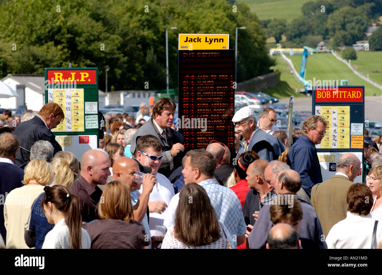 Bookmakers taking bets in the Betting Ring at Chepstow Racecourse Monmouthshire South Wales UK Stock Photo