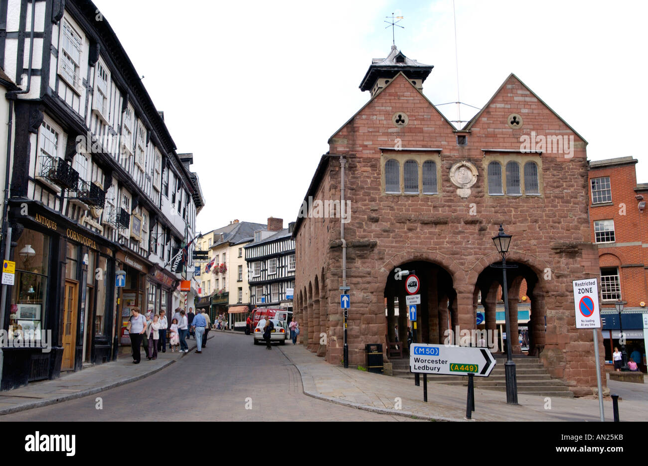Shops and historic Market Hall in town centre of Ross on Wye Herefordshire England UK Stock Photo