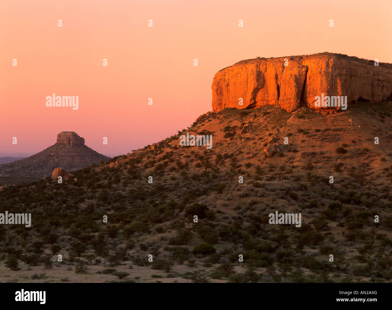 rock plateaus and savannah in Ugab valley at sunrise Ugab valley Namibia Africa Stock Photo