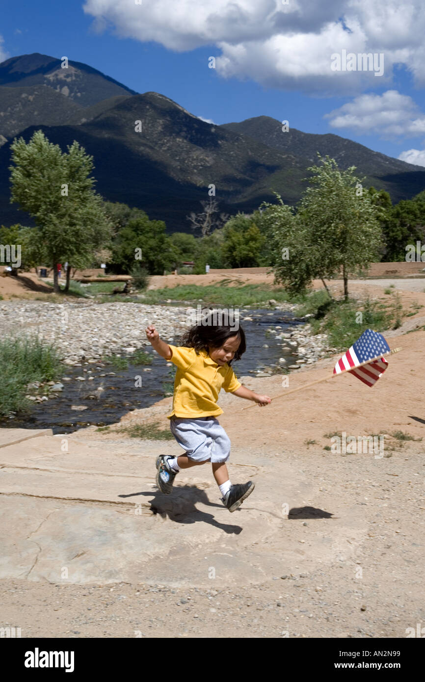 Taos Pueblo Little Boy Playing Stock Photo