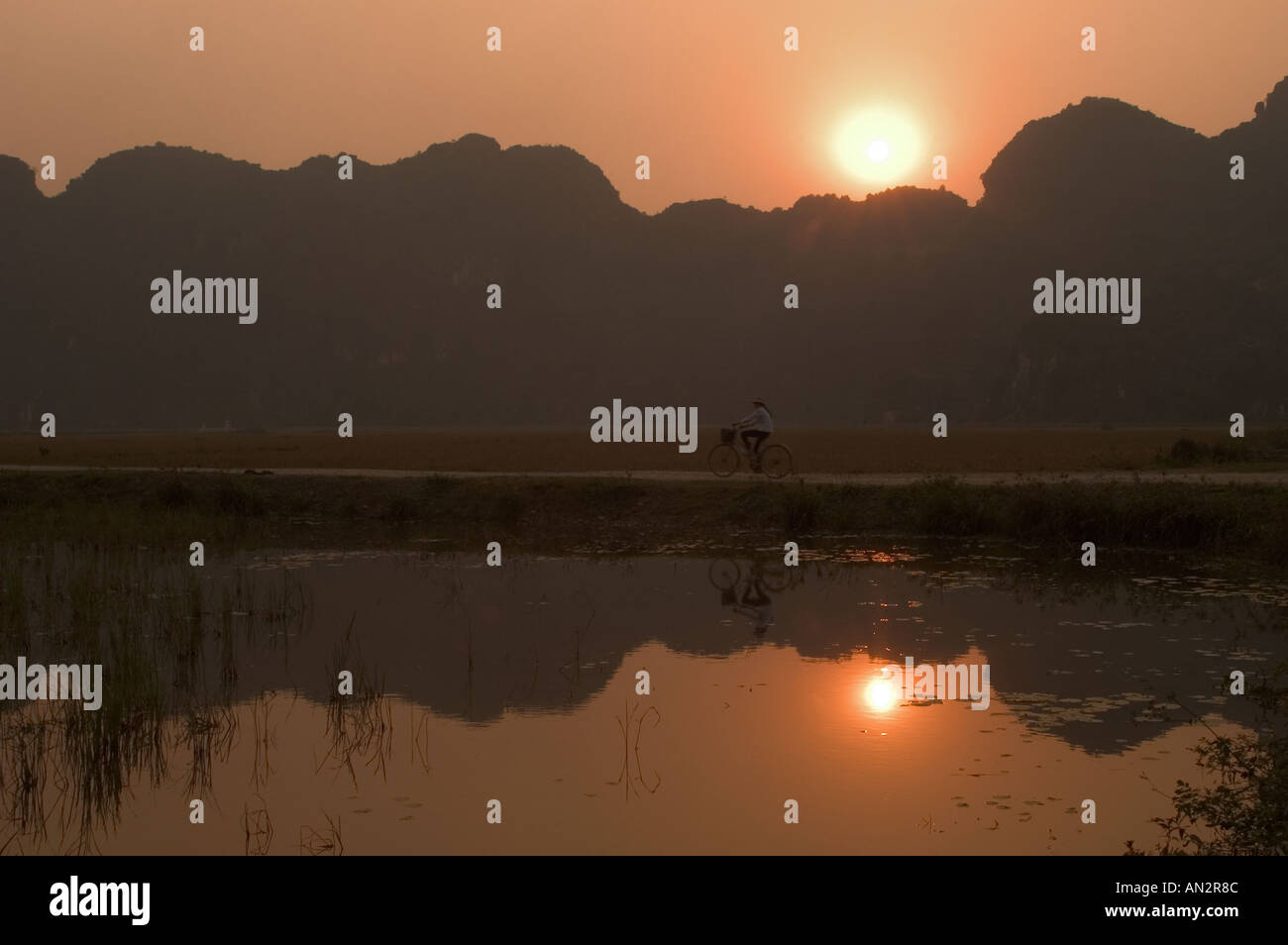 sunset limestone mountain scenery Tam Coc Ninh Binh south of Hanoi ...