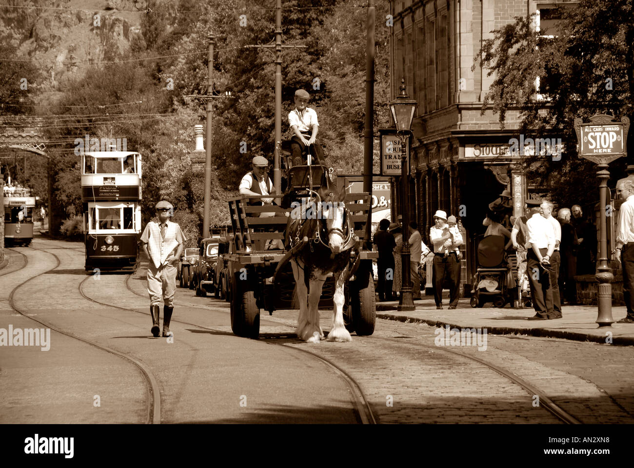 A horse and cart at Crich Tramway museum during a 40s event with Crich stand on the hill. Stock Photo