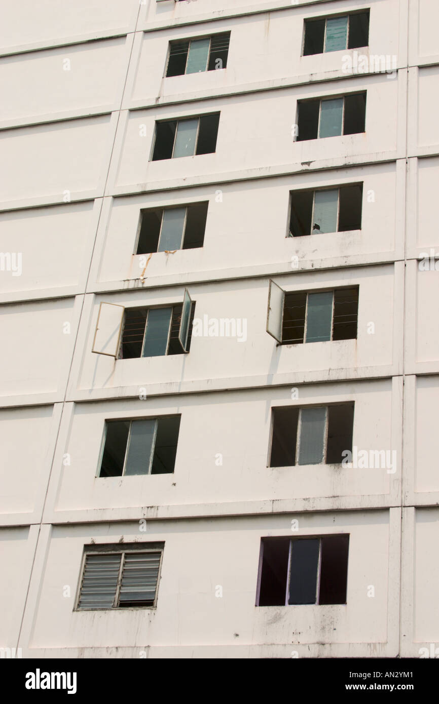 windows of abandoned flat building in Malaysia. 2006. Stock Photo
