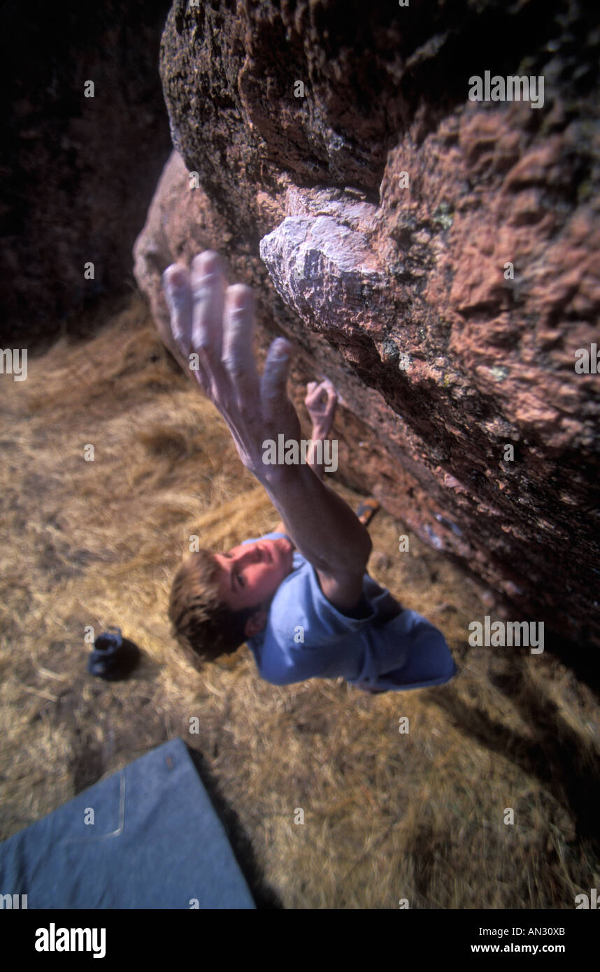 Rock climber reaches for a handhold Stock Photo - Alamy