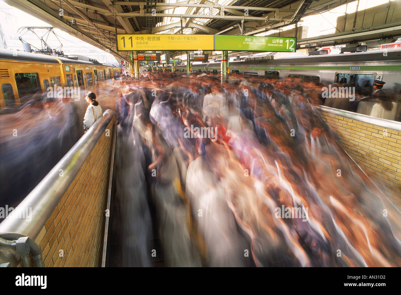 Morning rush hour at Shinjuku train station in Tokyo Stock Photo