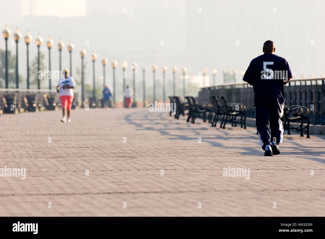 Early Morning Joggers Run In Liberty State Park Jersey City New Stock Photo Alamy