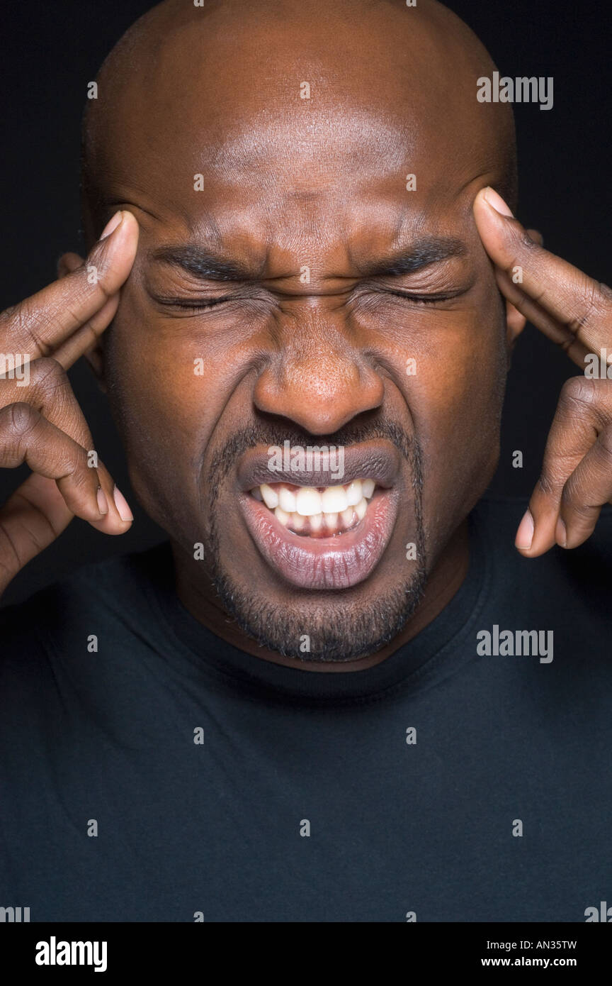 African man rubbing eyes hi-res stock photography and images - Alamy