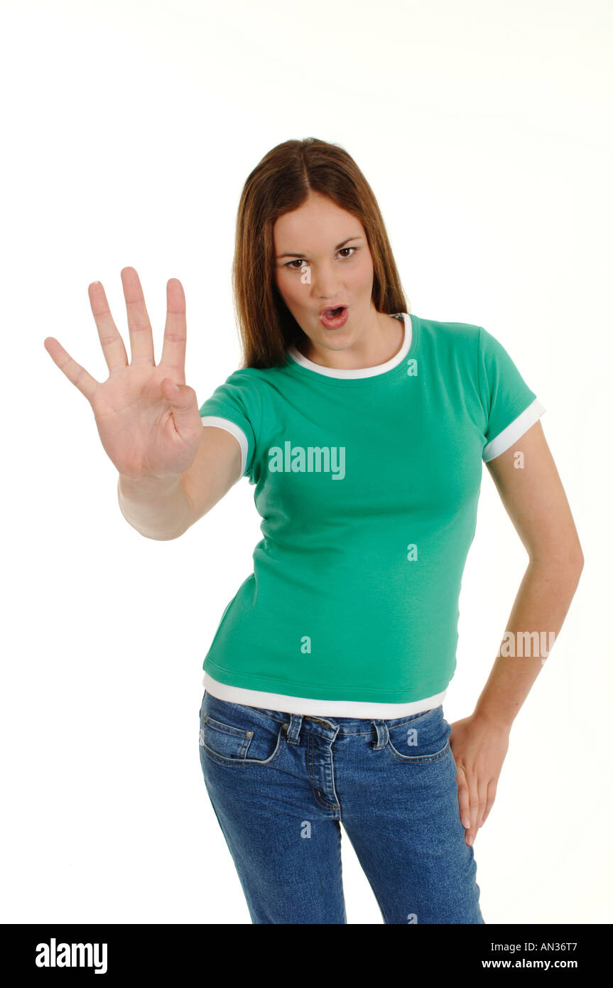 a teenage girl holding up four fingers to the camera Stock Photo - Alamy