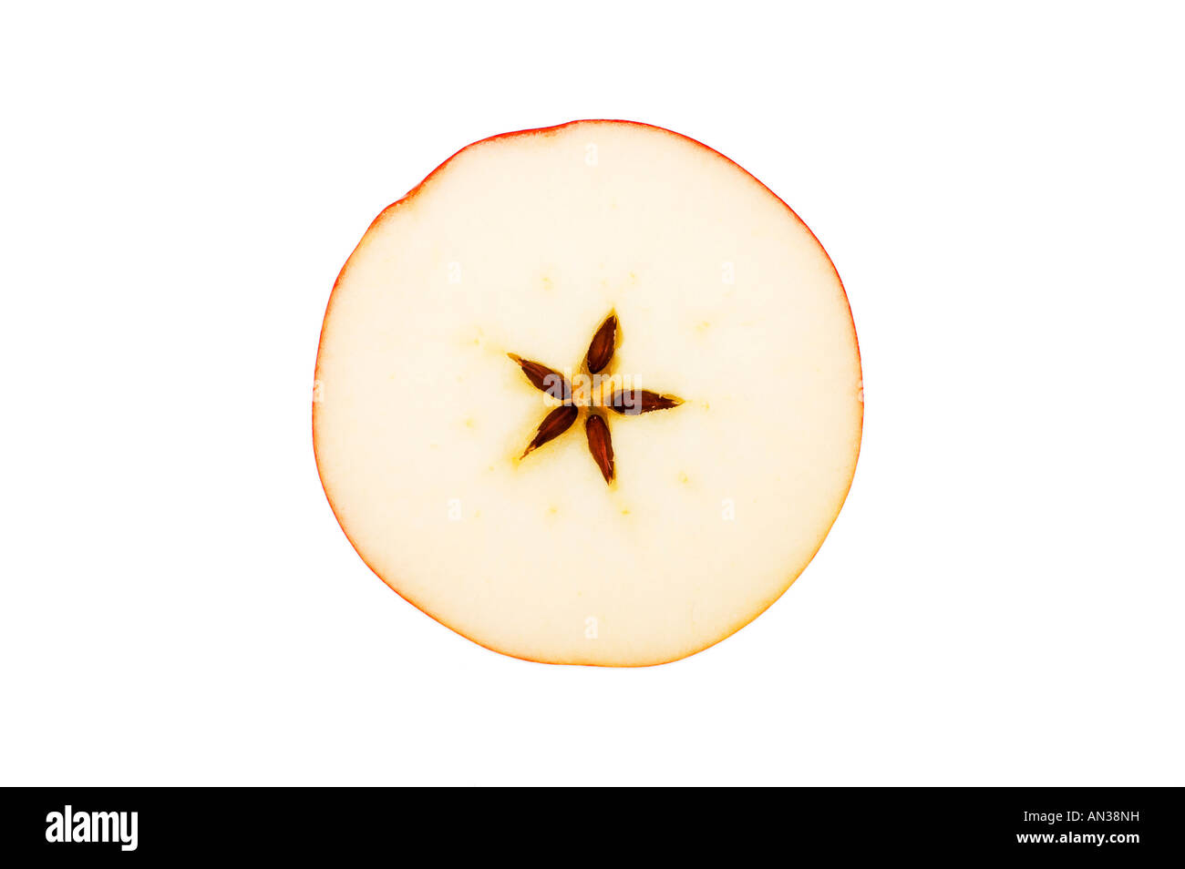 christmas motive cross section of red apple on white background Stock Photo