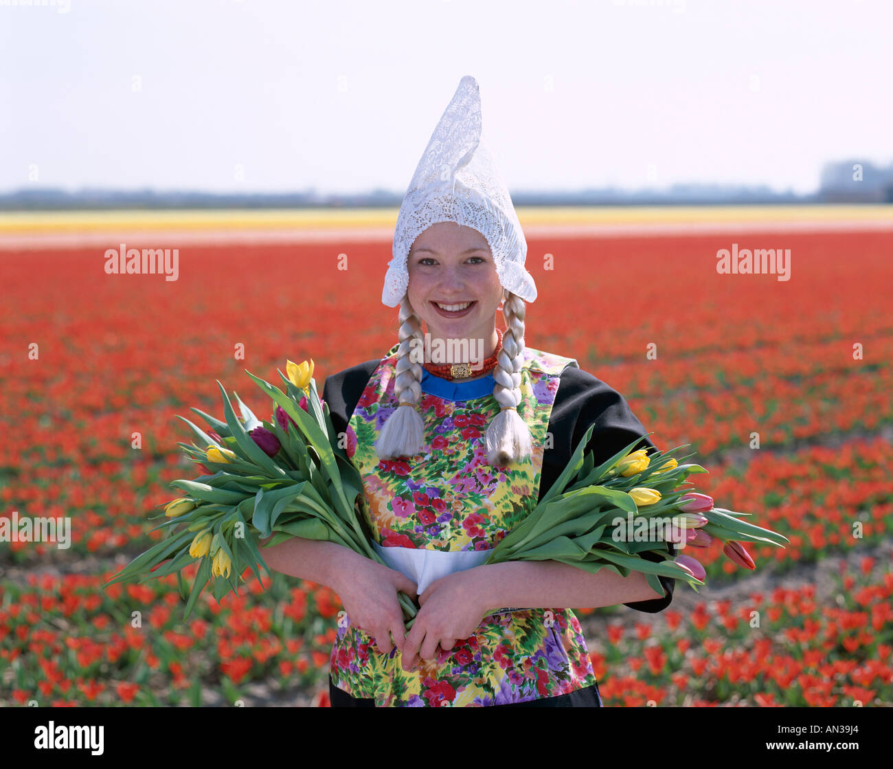 Bulb Fields / Tulip Fields / Girl Dressed in Dutch Costume with Tulips ...