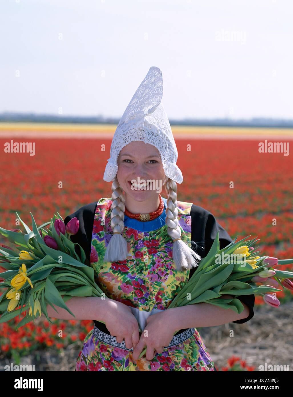 Bulb Fields / Tulip Fields / Girl Dressed in Dutch Costume with Tulips