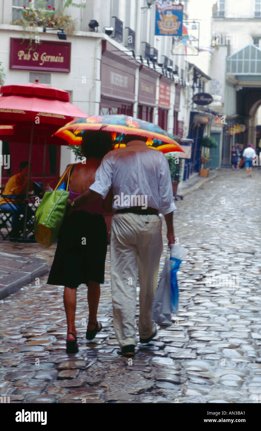Umbrella raining paris hi-res stock photography and images - Alamy