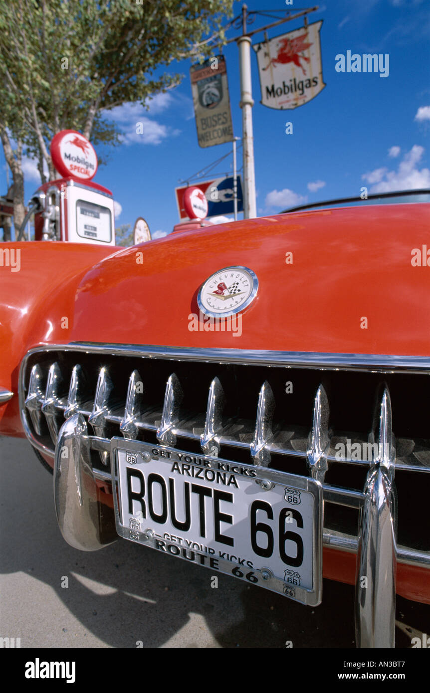 Route 66 / Red Chevrolet Corvette 1957 Car at Gas Station, Hackberry, Arizona, USA Stock Photo