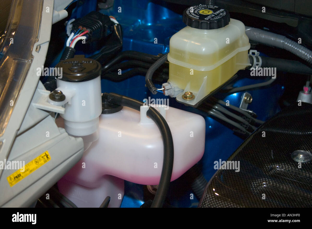 car brake oil and radiator fluid reservoir tank Stock Photo Alamy