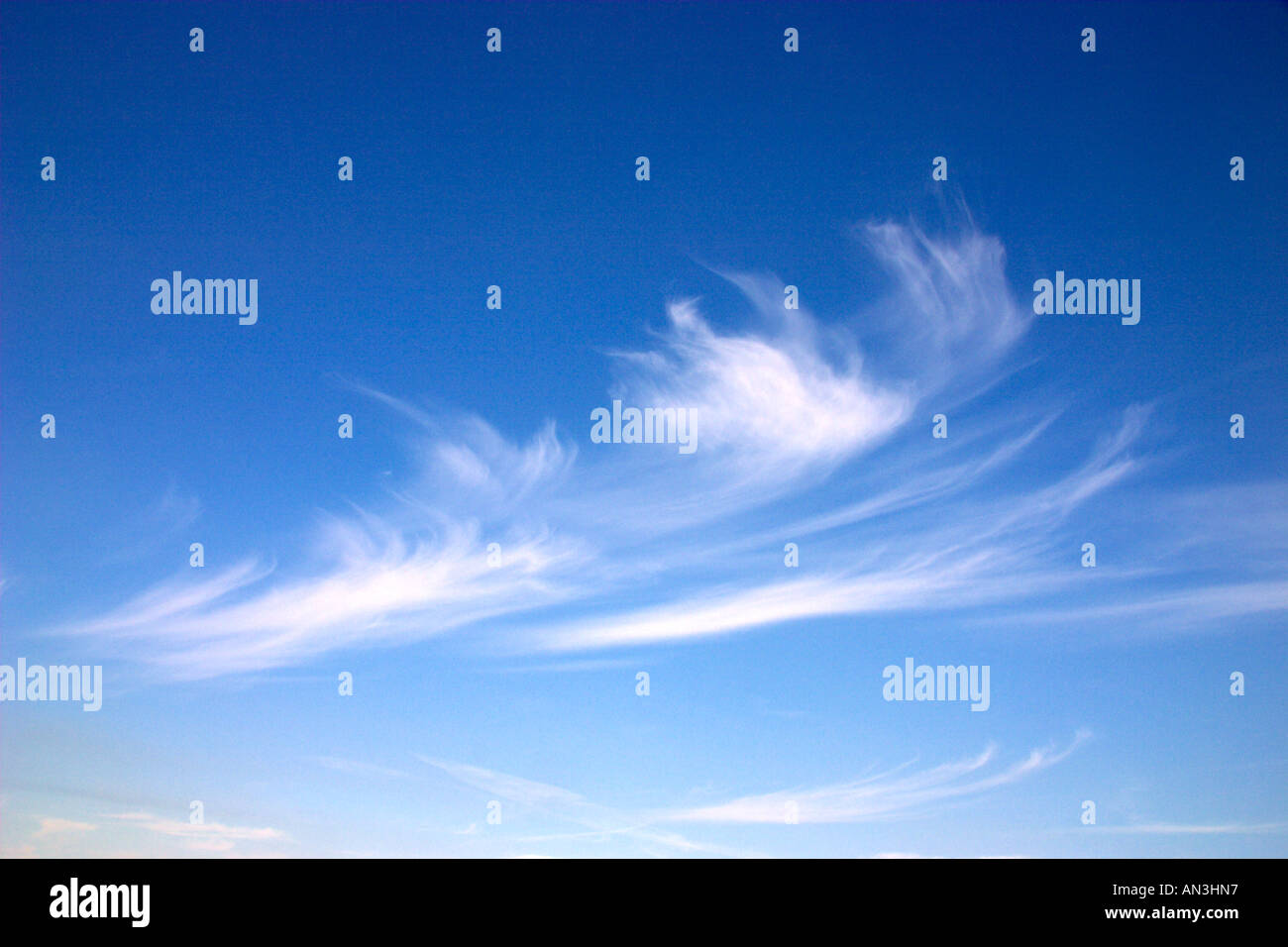 Cirrus clouds in a blue sky Stock Photo
