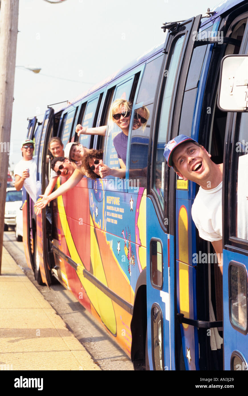 PEOPLE ON BUS STICKING HEADS OUT WINDOWS Stock Photo Alamy