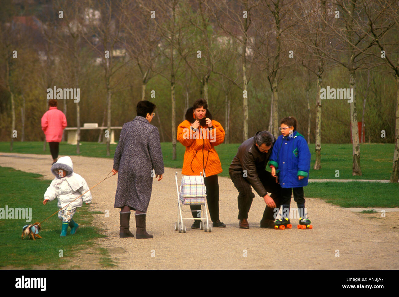 French people person father and mother ans children in park Verneuil-sur-Seine Ile-de-France region France Europe Stock Photo