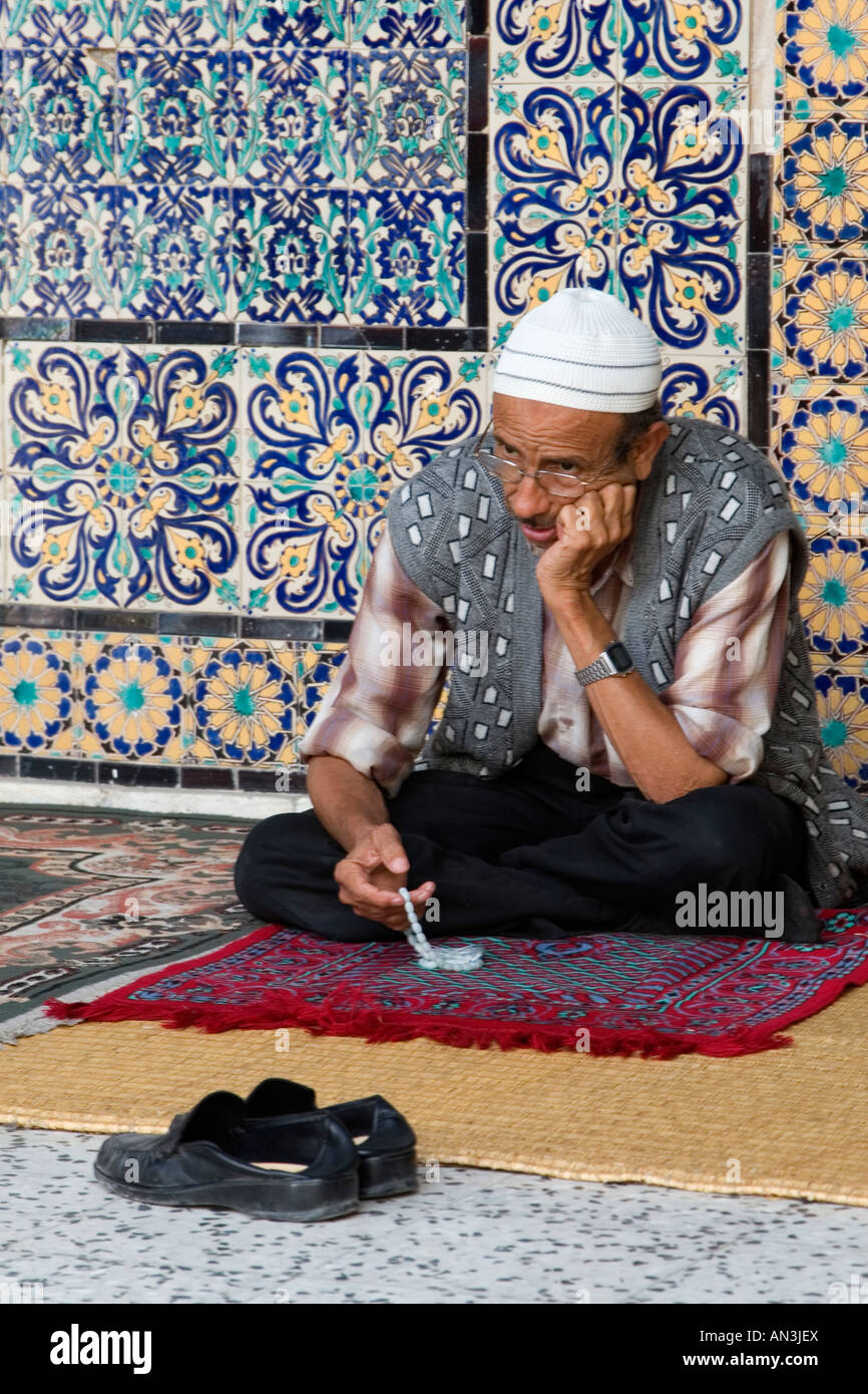 Tripoli, Libya. Man Praying Using Prayer Beads, Karamanli Mosque, Tripoli Medina Stock Photo
