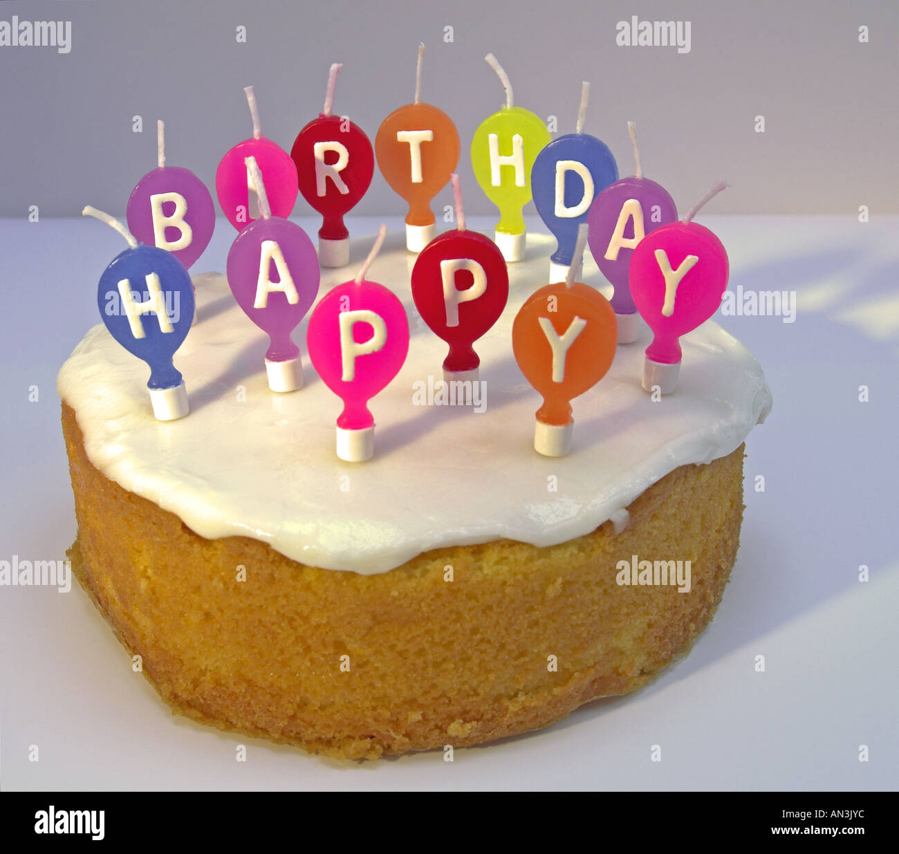 Birthday cake with unlit candles Stock Photo Alamy