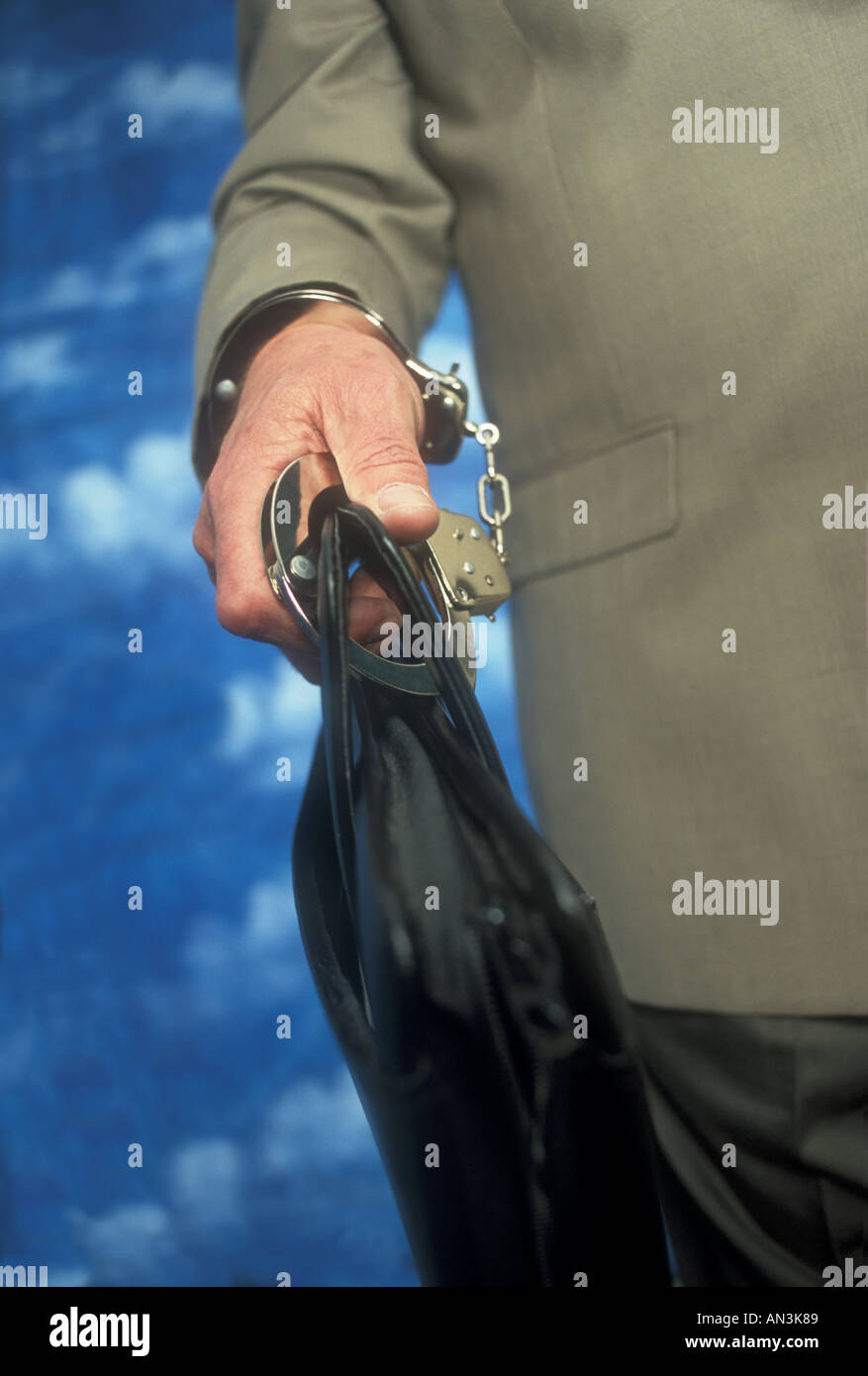 Handcuffs Attached to Briefcase Stock Photo Alamy
