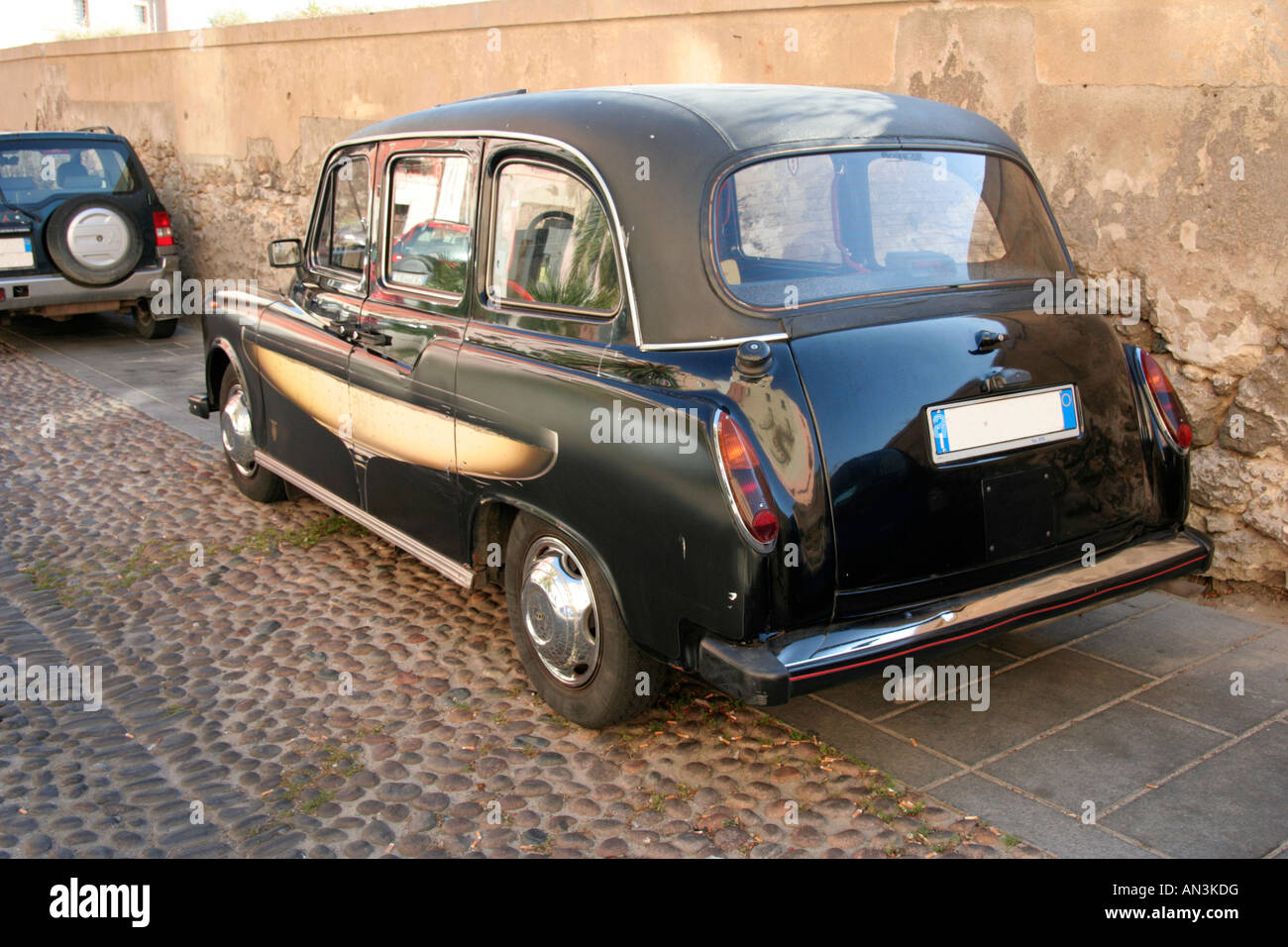 Cagliari London Black Taxi Cab Stock Photo