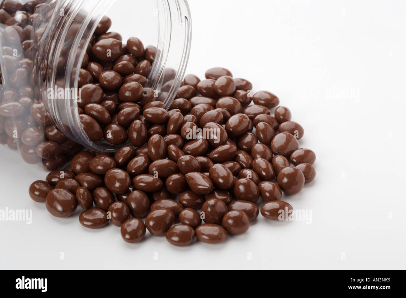 Jar of raisins covered in chocolate Stock Photo Alamy