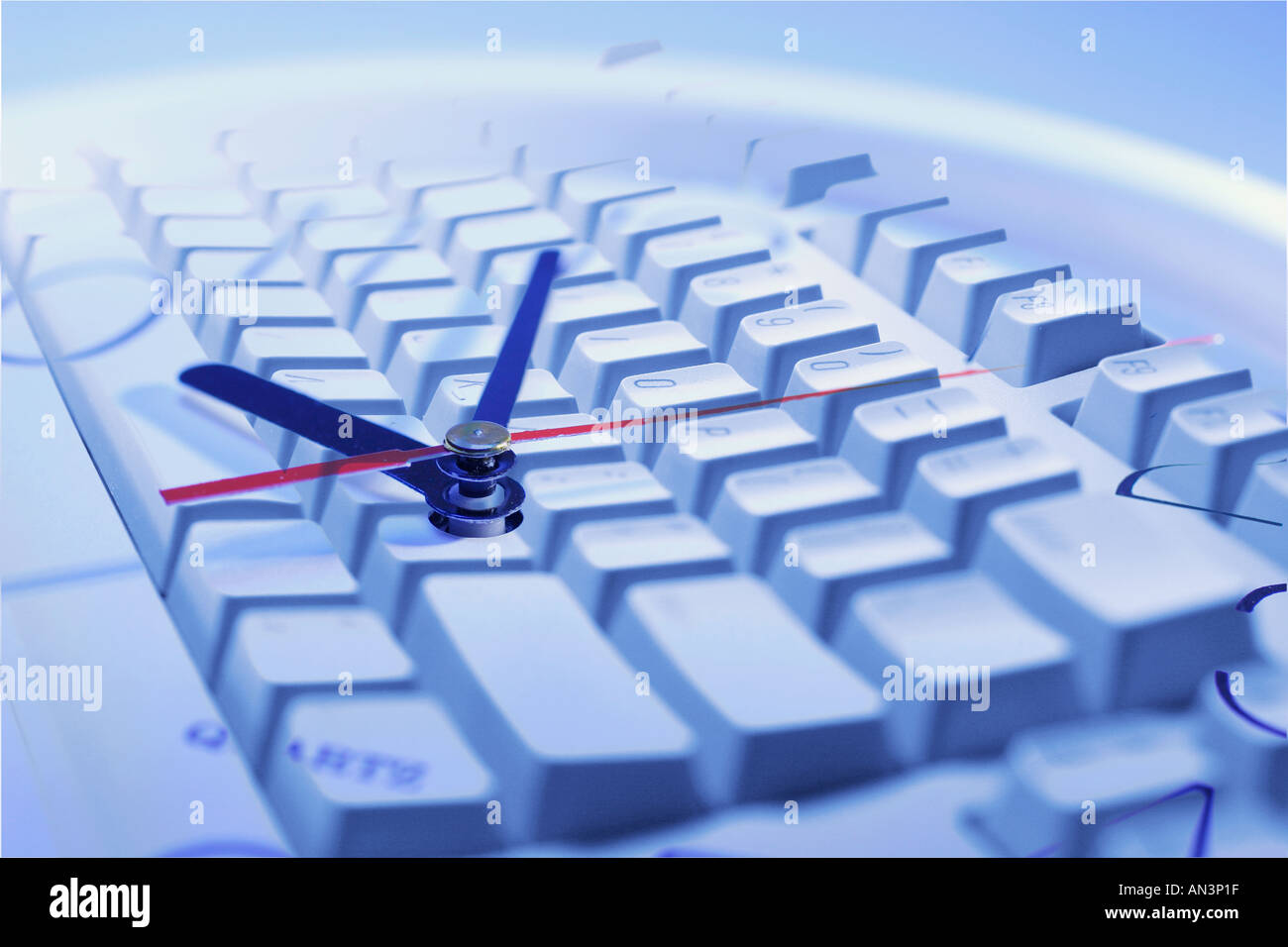 Computer Keyboard and Clock Stock Photo Alamy