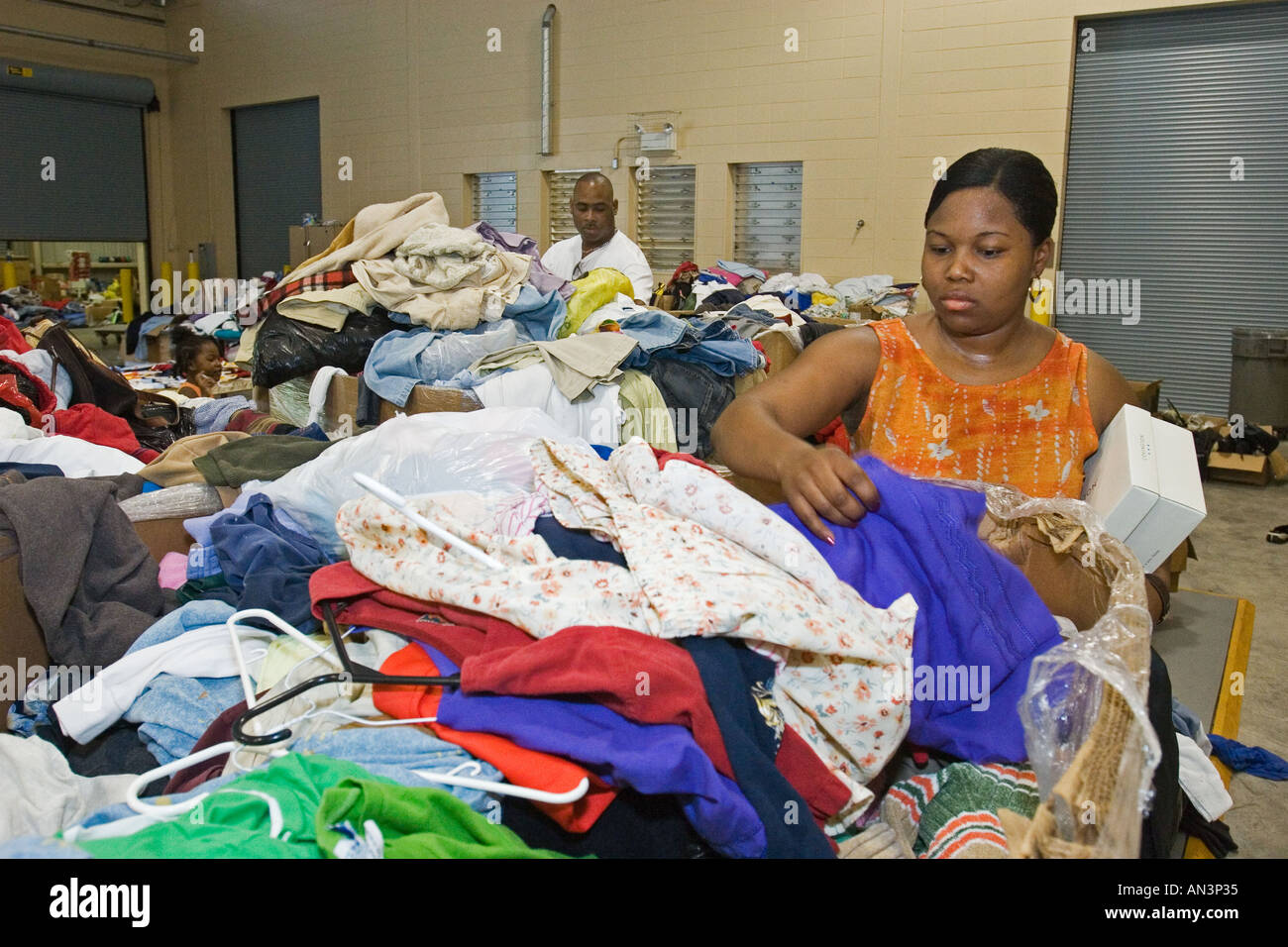 Hurricane Katrina Survivors Look for Donated Clothing in Shelter Stock  Photo - Alamy