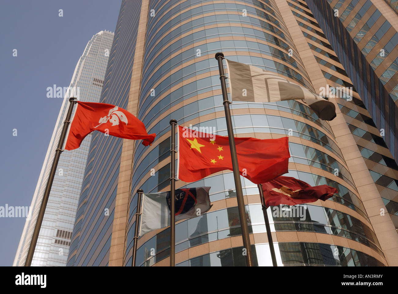 Hong Kong, Chinese and Stock Exchange flags flying Stock Photo