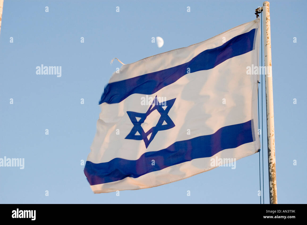Israeli Flag blue sky and moon Stock Photo