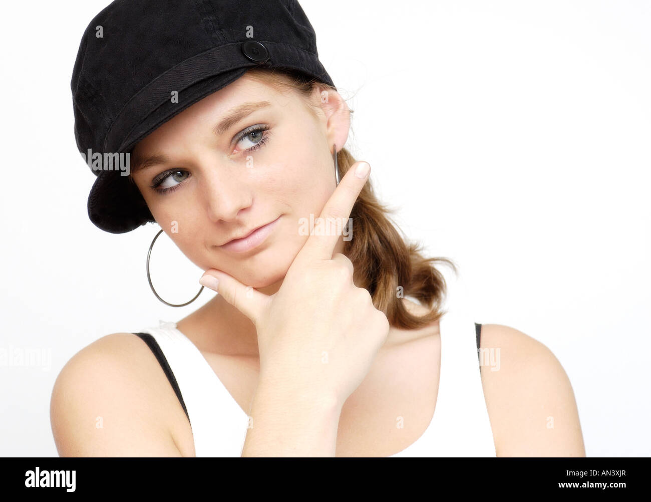 young woman with black cap Stock Photo