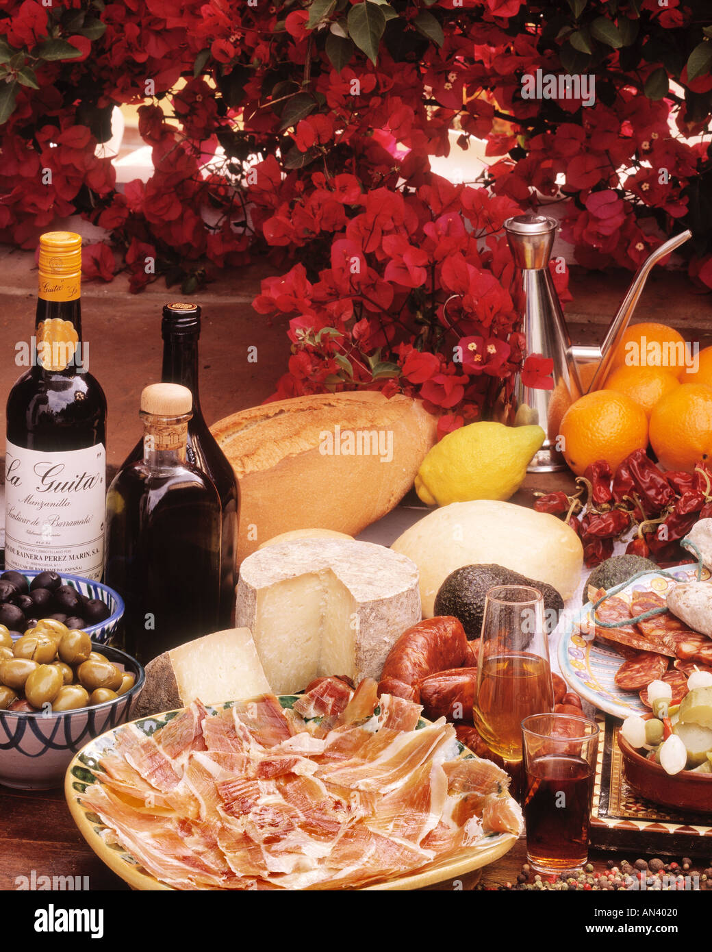 Spain olives cheeses wine sherry chorizo saussages ham all goodies from Andalusia  Stock Photo