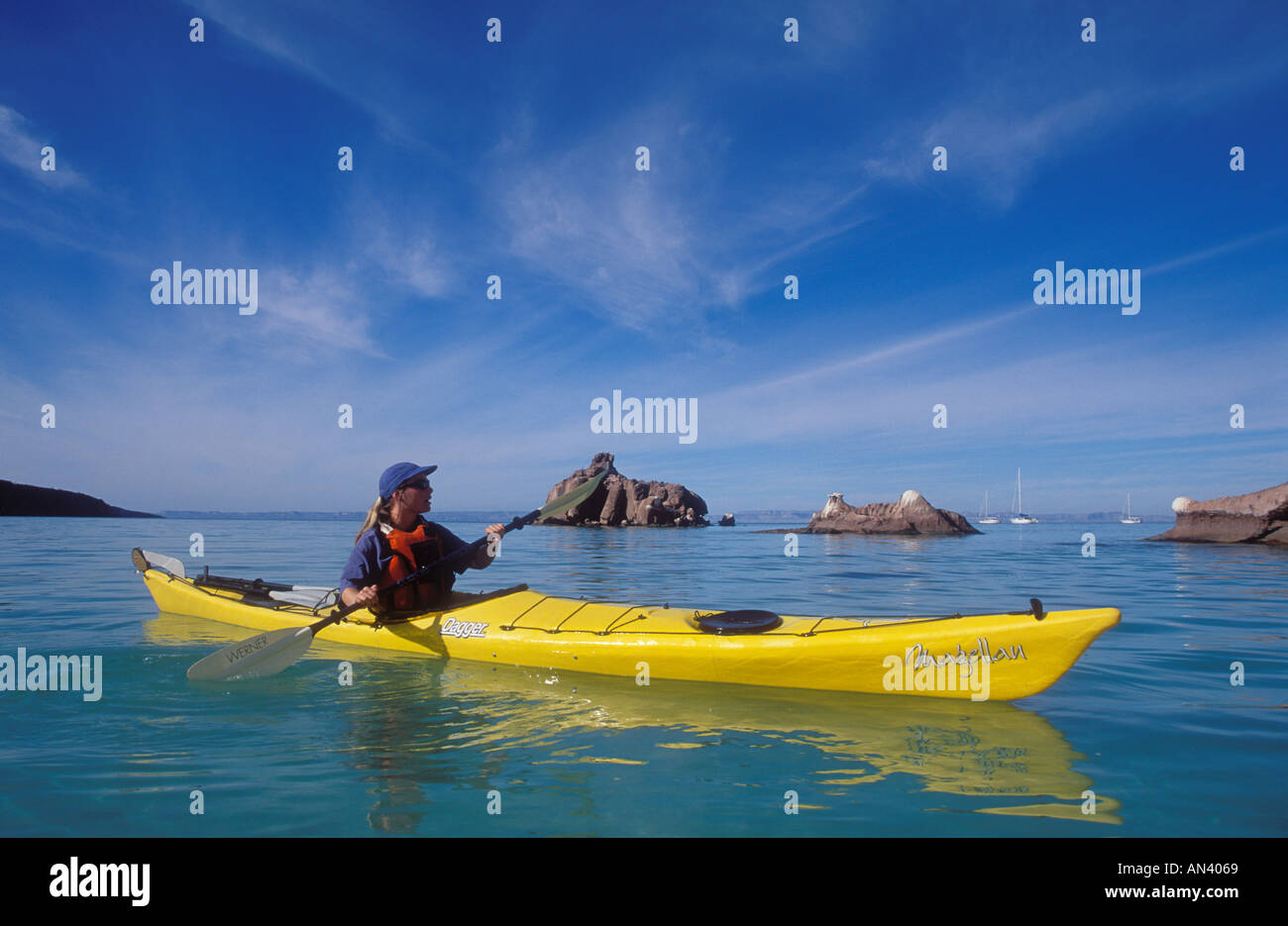 Baja California Sur Mexico woman sea kayaking in the Sea of Cortez at