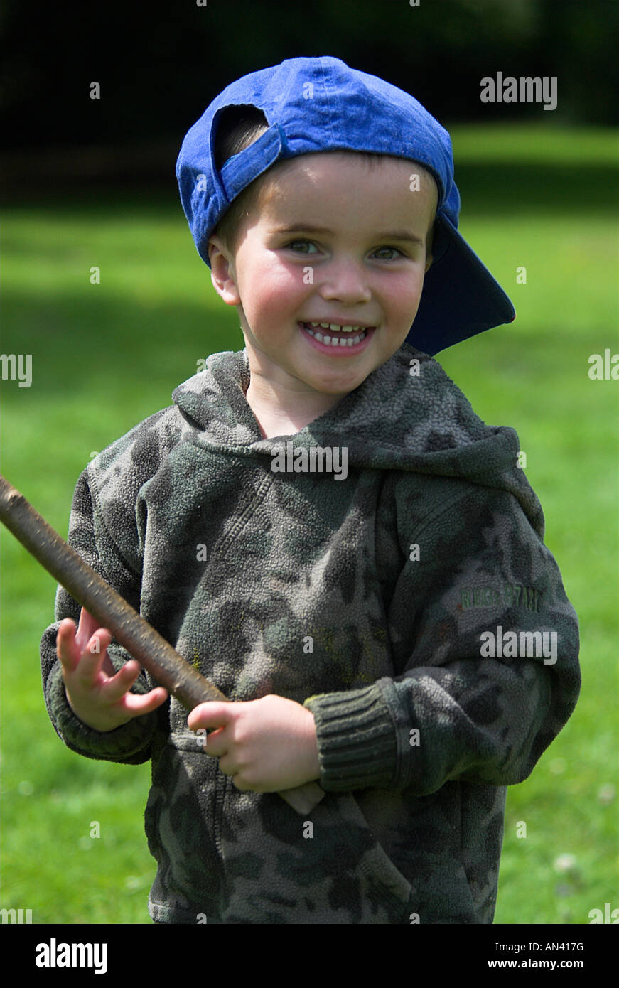 Young boy with stick Stock Vector Images - Alamy