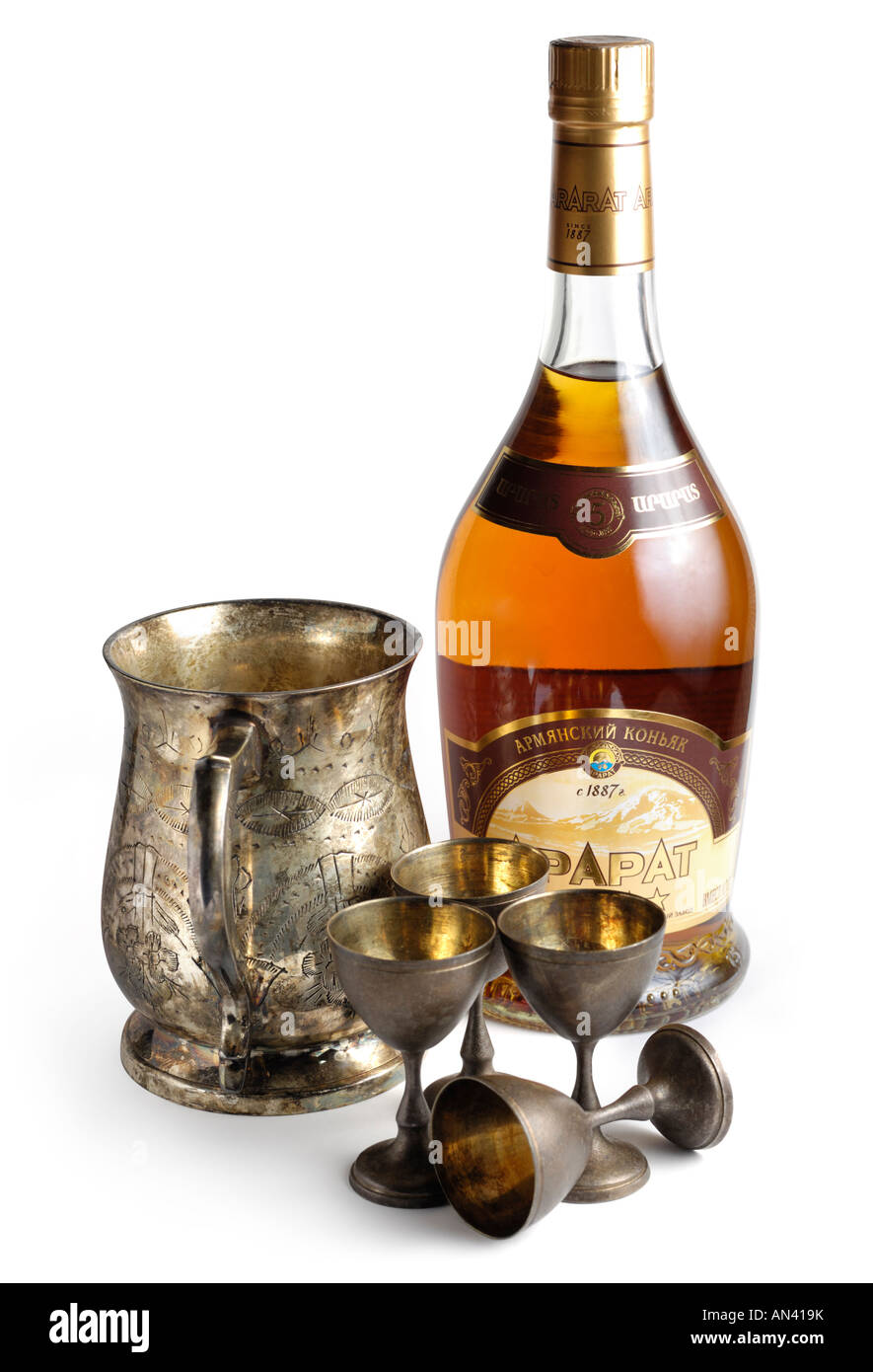 Bottle of famous Armenian cognac ARARAT and vintage silverware Stock Photo
