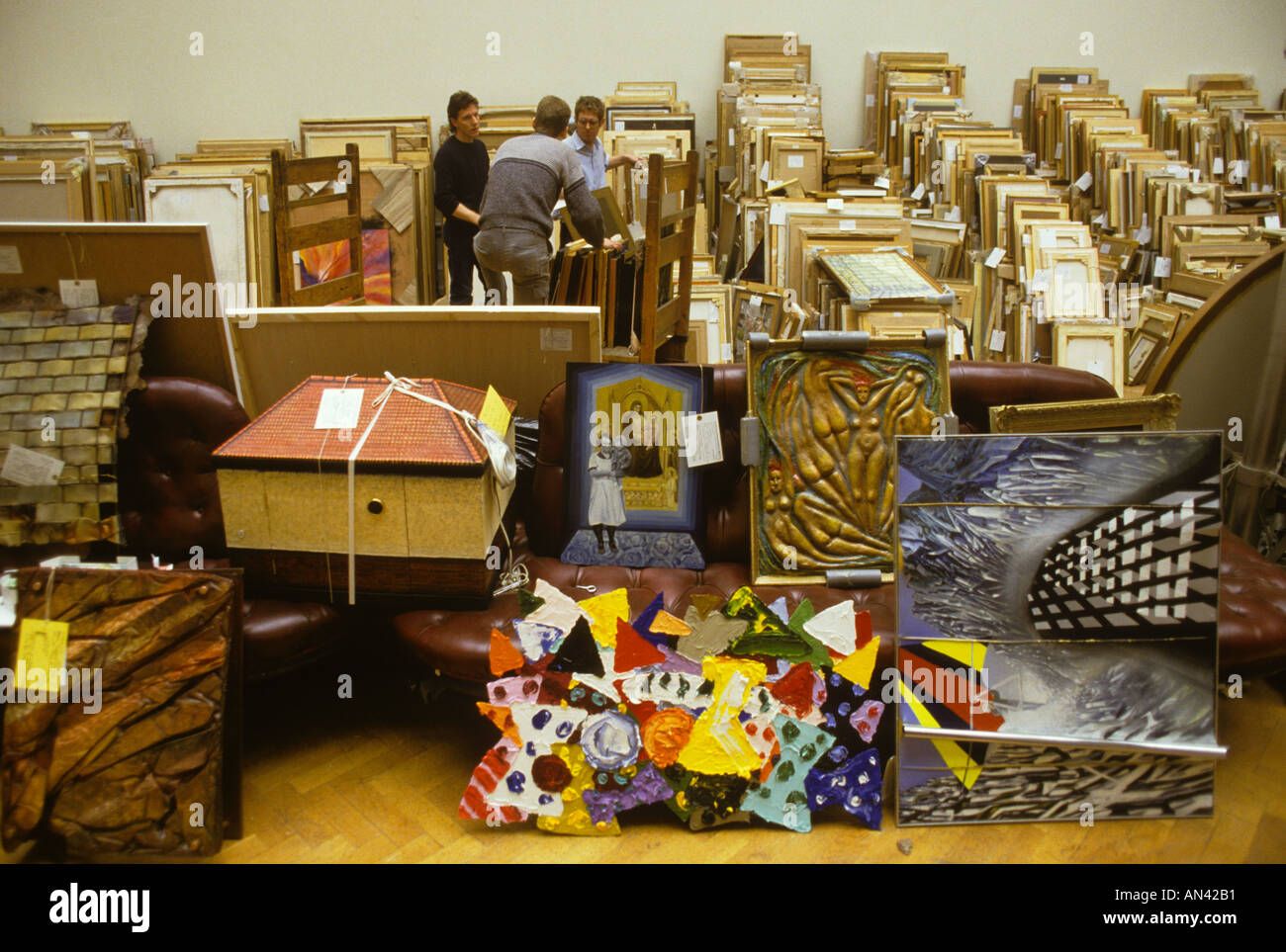 1980s Royal Academy Summer Exhibition Burlington House British amateur professional art show work stacked up to be selected from London UK HOMER SYKES Stock Photo