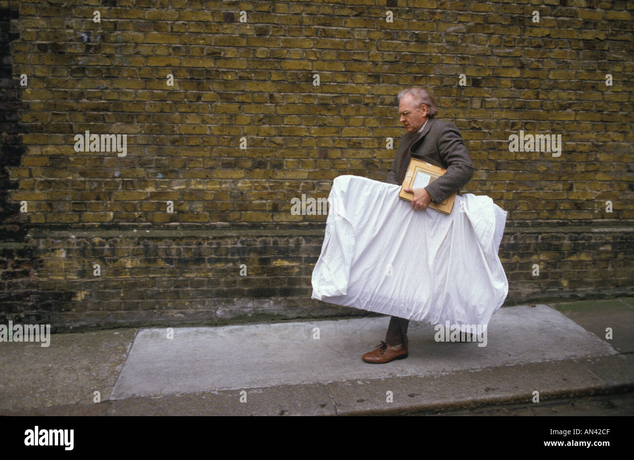 Royal Academy Summer Exhibition Burlington House British amateur professional art show London. Man delivering his work of art a painting HOMER SYKES Stock Photo