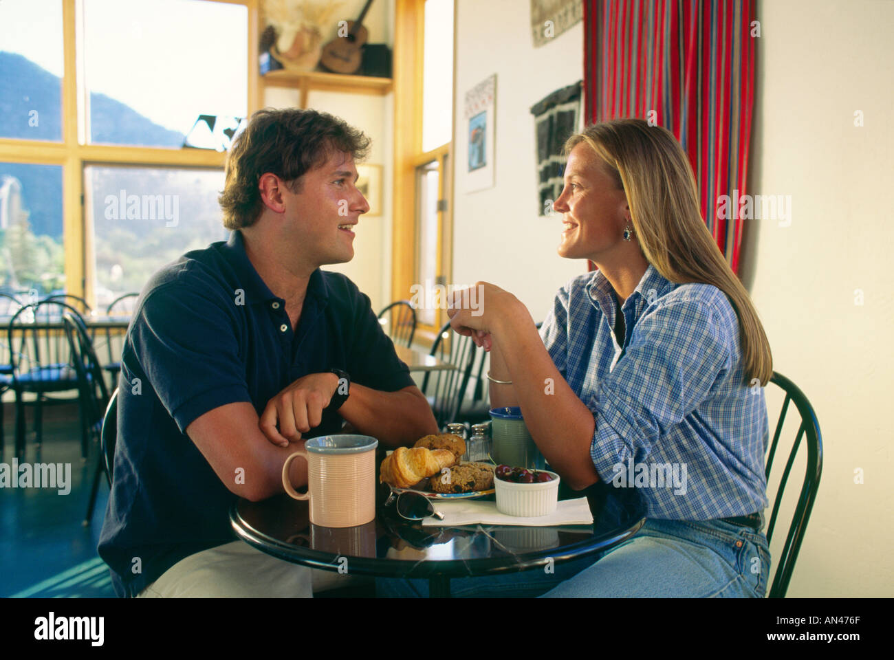 couple having coffee in cafe Stock Photo