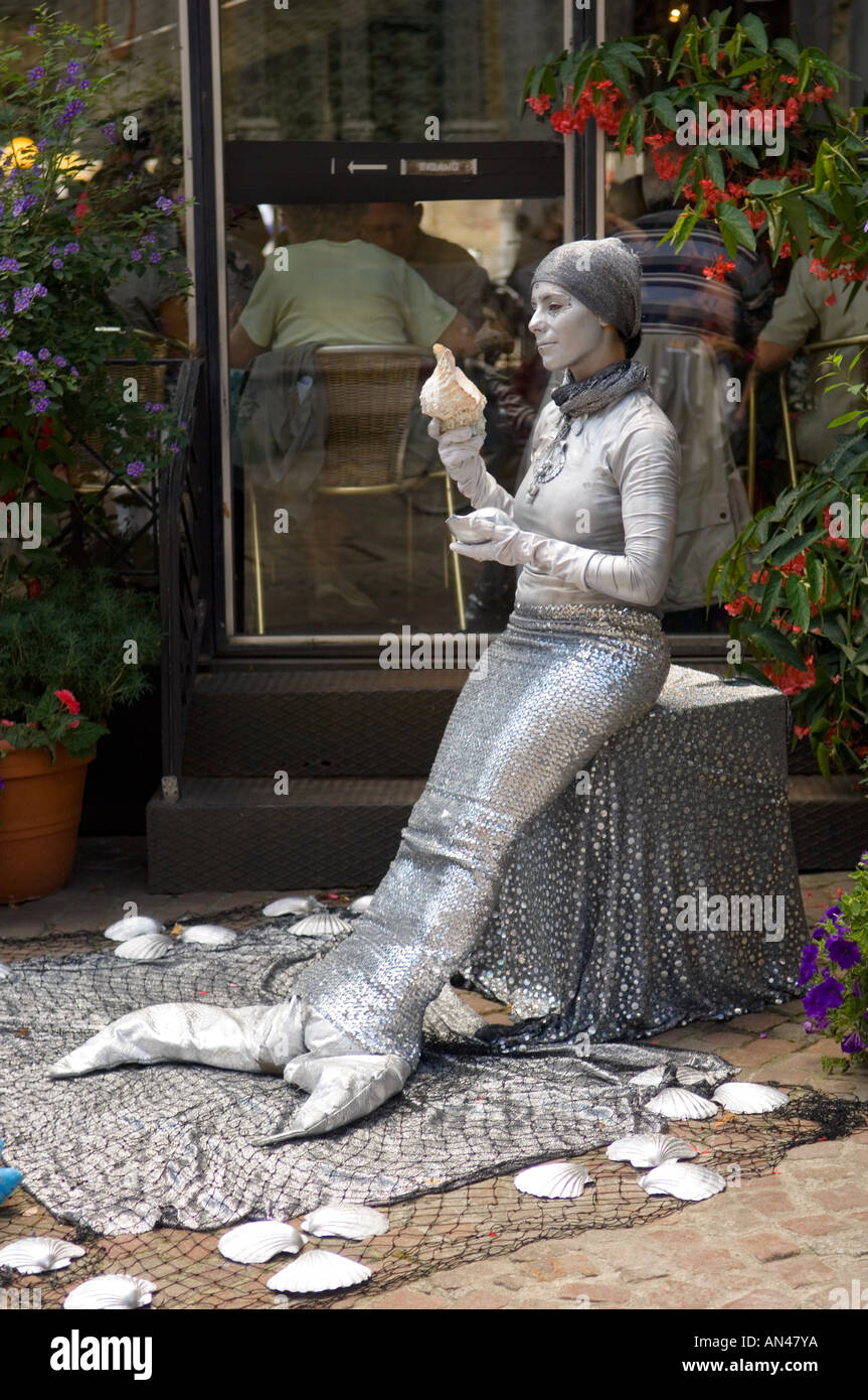 Mermaid street performer in Bruges Belgium Stock Photo
