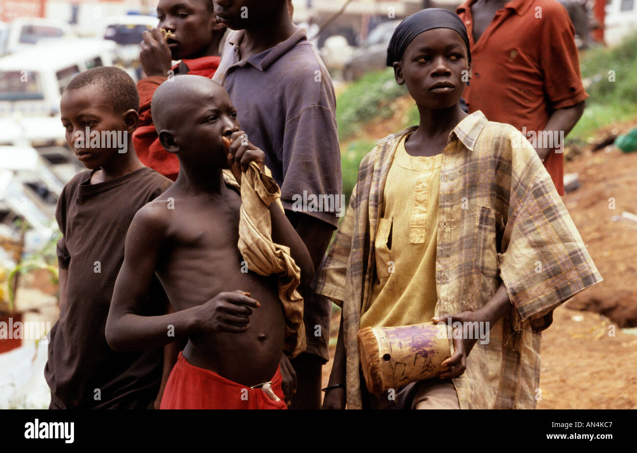 Young glue sniffers on streets, Kampala, Uganda Stock Photo