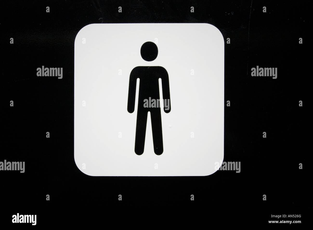 Male man men bathroom toilet door sign in London UK room  lady restroom black and white mono monochrome lavatory only Stock Photo