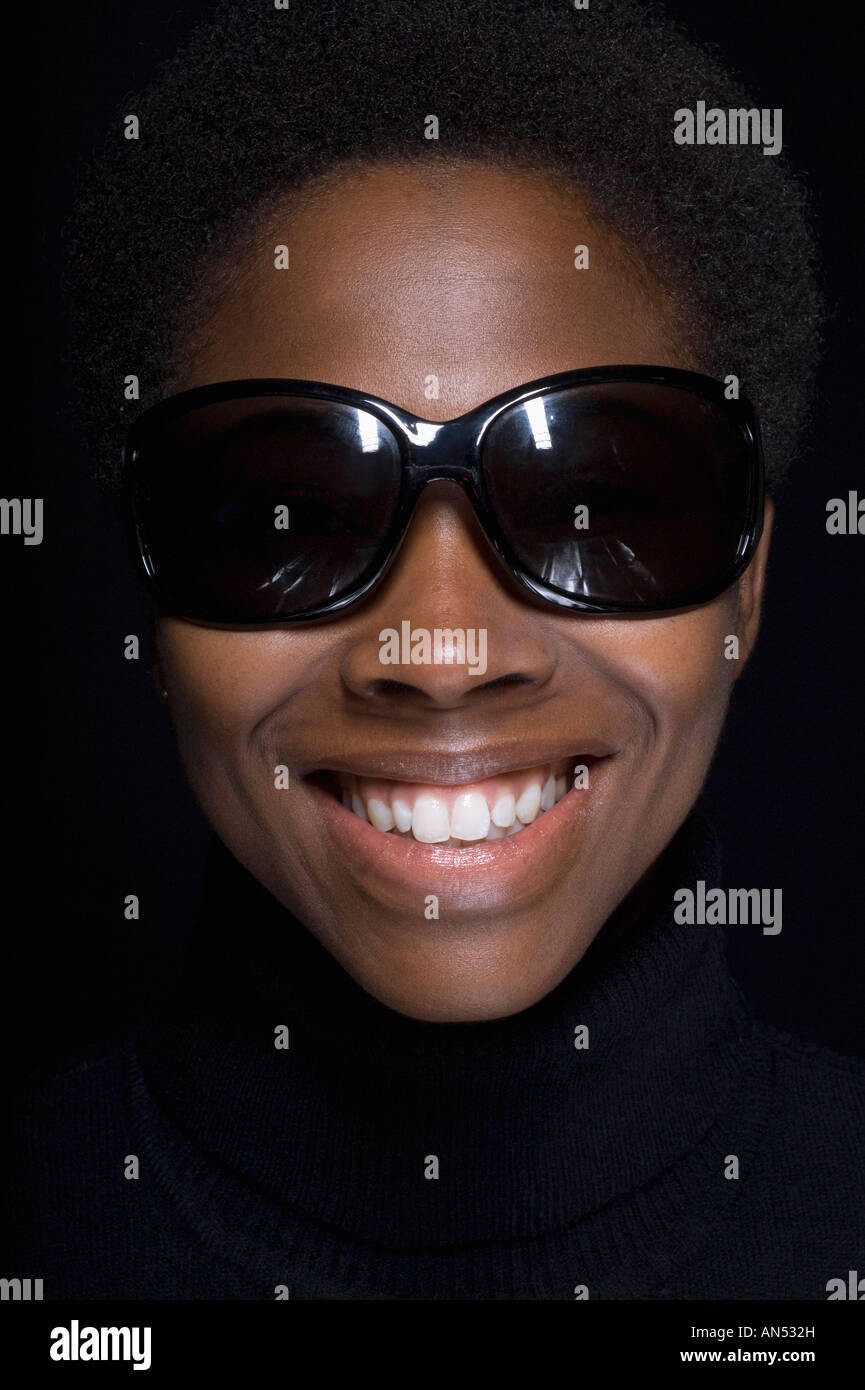 Portrait of African woman wearing sunglasses Stock Photo - Alamy