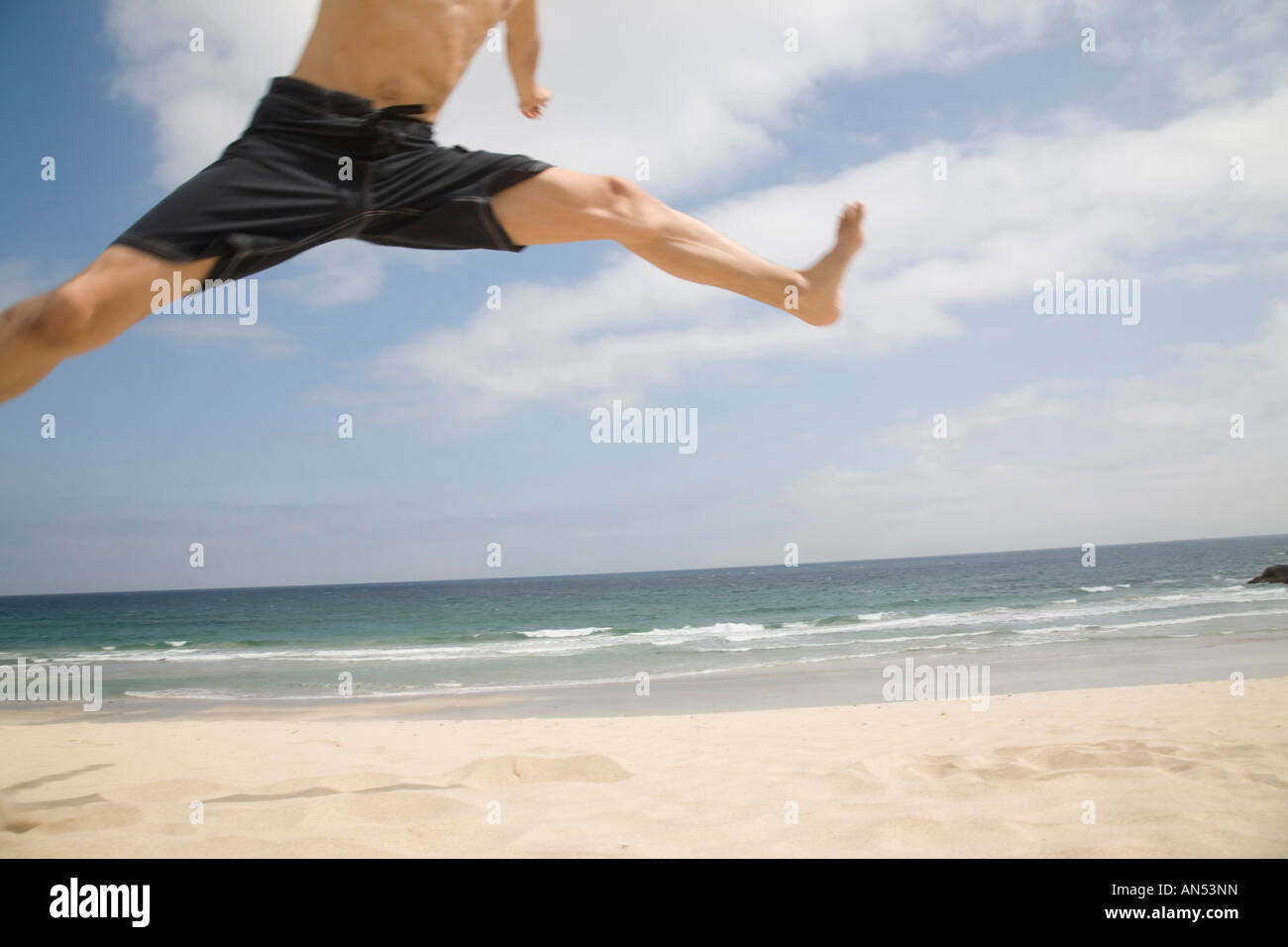 Foot of jumping man Stock Photo Alamy