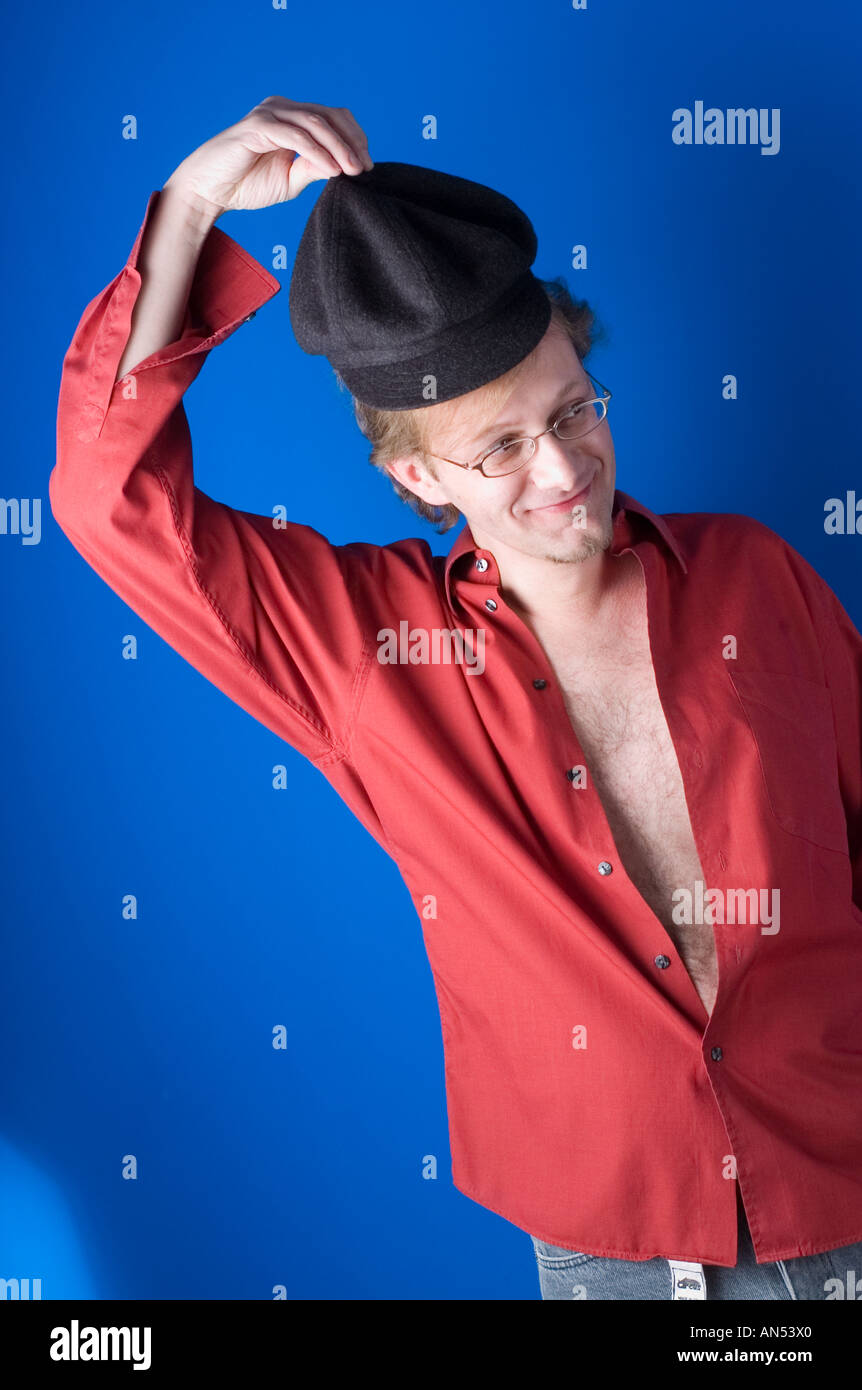 man pulling hat off his head Stock Photo Alamy