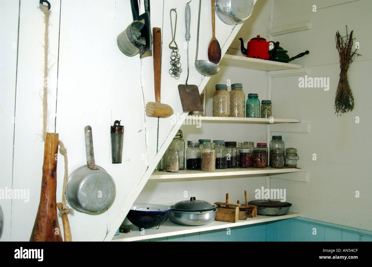 An old style pantry and kitchen utensils at the Mennonite Heritage Village  in Steinbach Manitoba Canada Stock Photo - Alamy