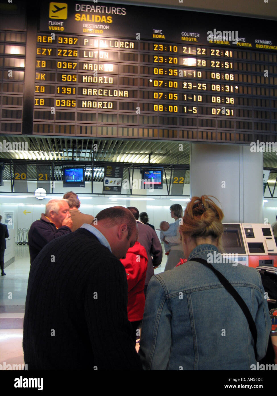 Airport Check In Desk Line at Alicante Airport Spain Europe Stock Photo