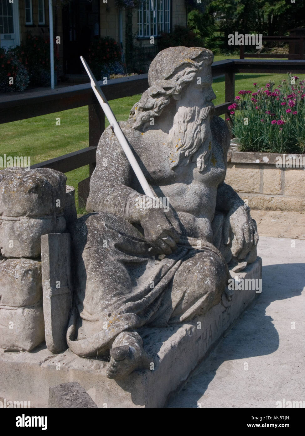 Statue of 'Old Father Thames' based on Neptune at St John's Lock, the highest lock on the River Thames at Lechlade-on-Thames Stock Photo