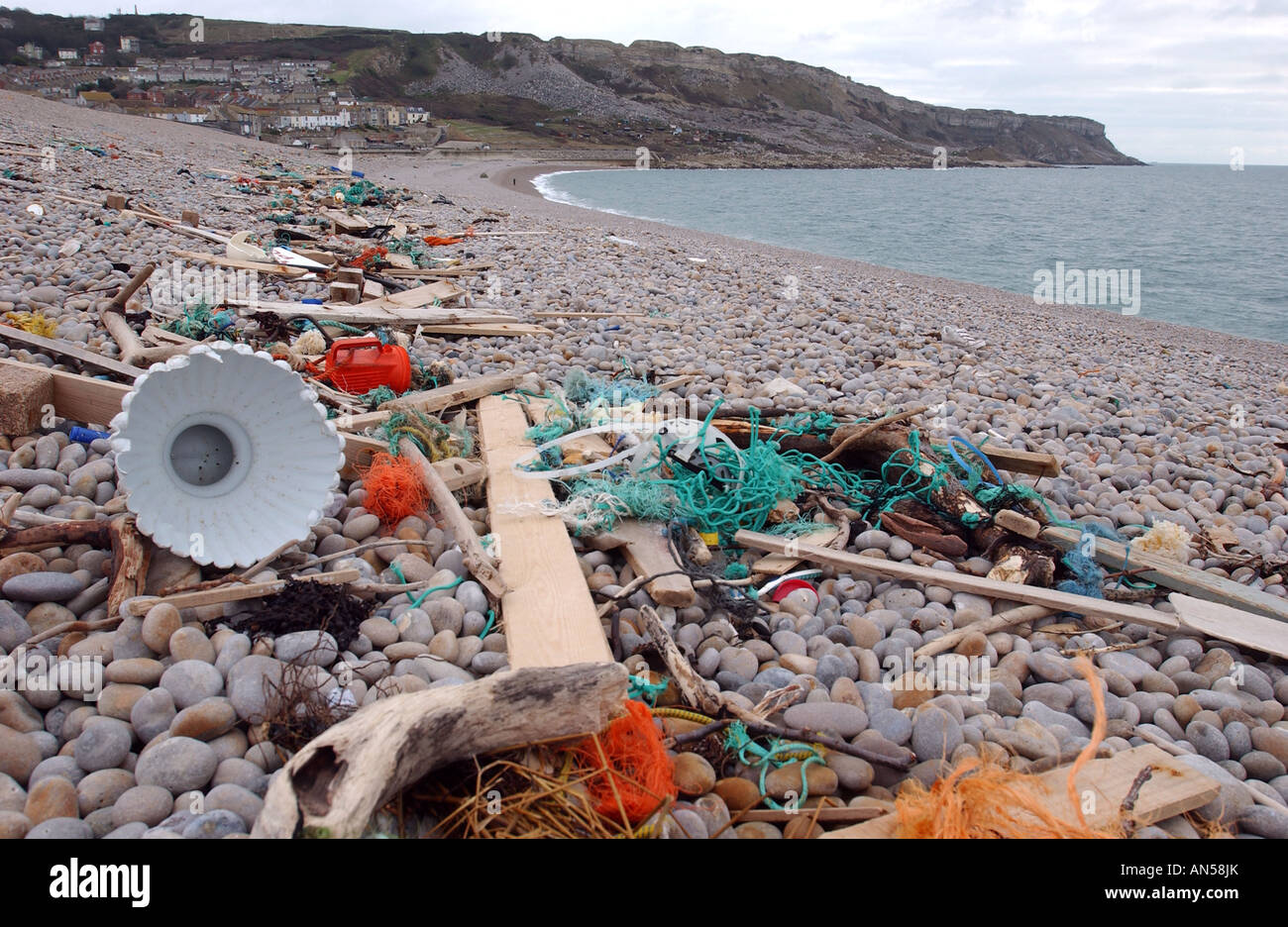 Rubbish washed up on Chesil Beach in Dorset, England, UK Stock Photo