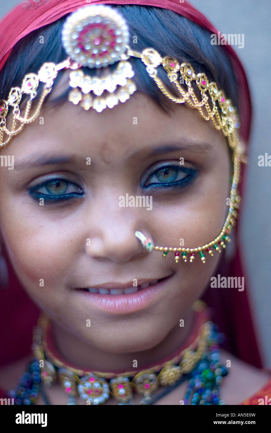 Portrait of a smiling gypsy girl from Rajasthan, India.