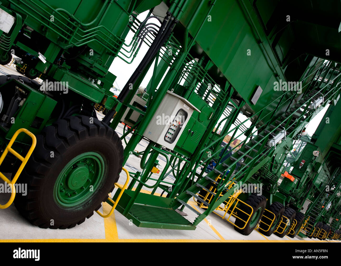 graphic angled shot of rubber mounted gantry container crane wheels at PSA Singapore Shipping